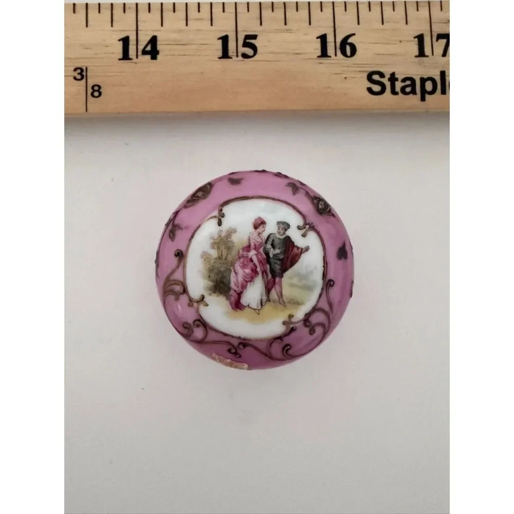 Vintage Limoges style trinket box with courting couple